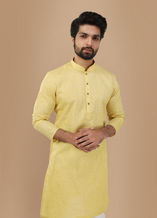 alt message - Manyavar Men Faded Yellow Solid Kurta image number 0